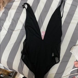 Deep cut one piece swim